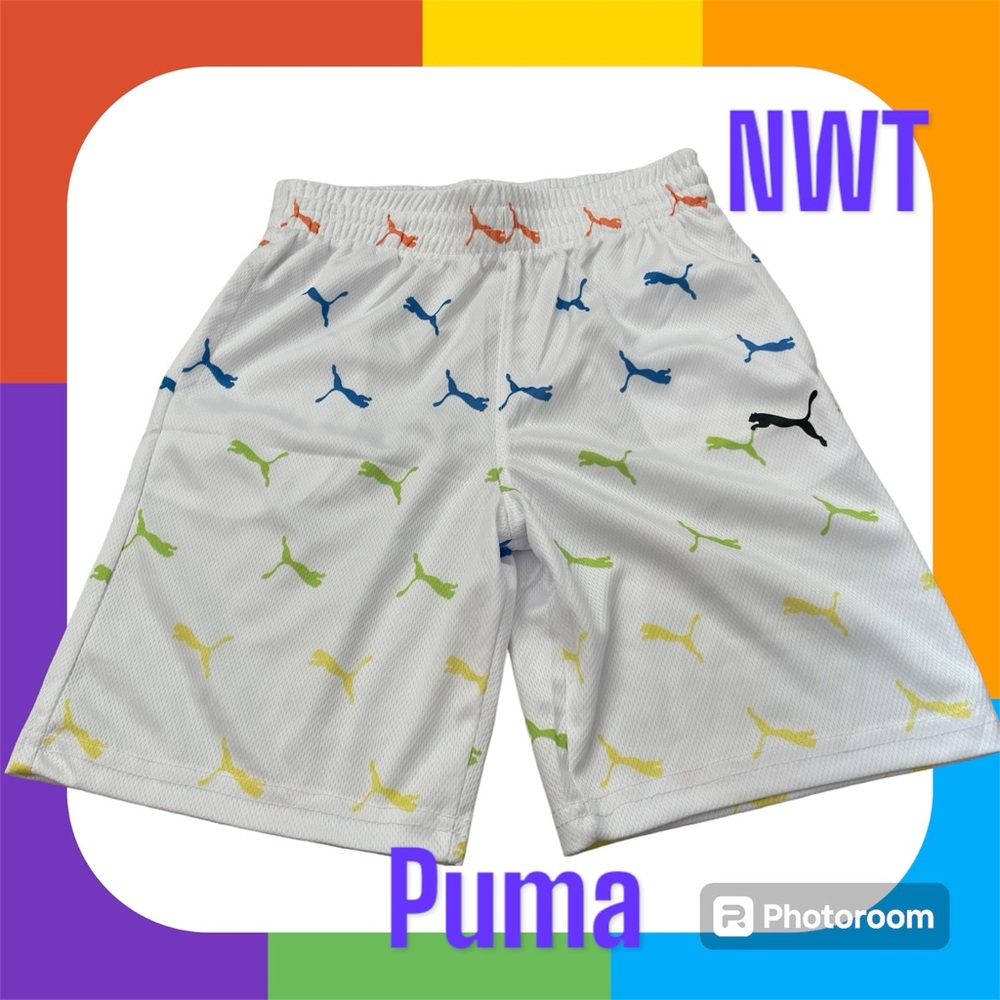 NWT. Kid’s Puma Shorts. White w/ Multicolored Puma Logo. Size 6. 100% Poly.